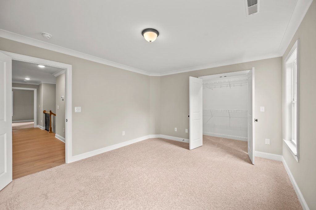Upstairs bedroom with closet