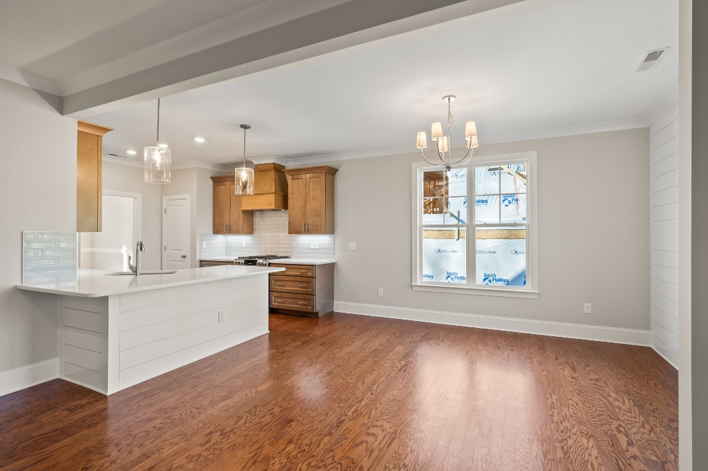 555 Alpine Rd. Great room with fireplace and shiplap.