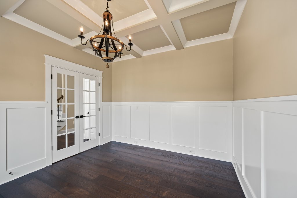 Formal dining room with coffered ceiling