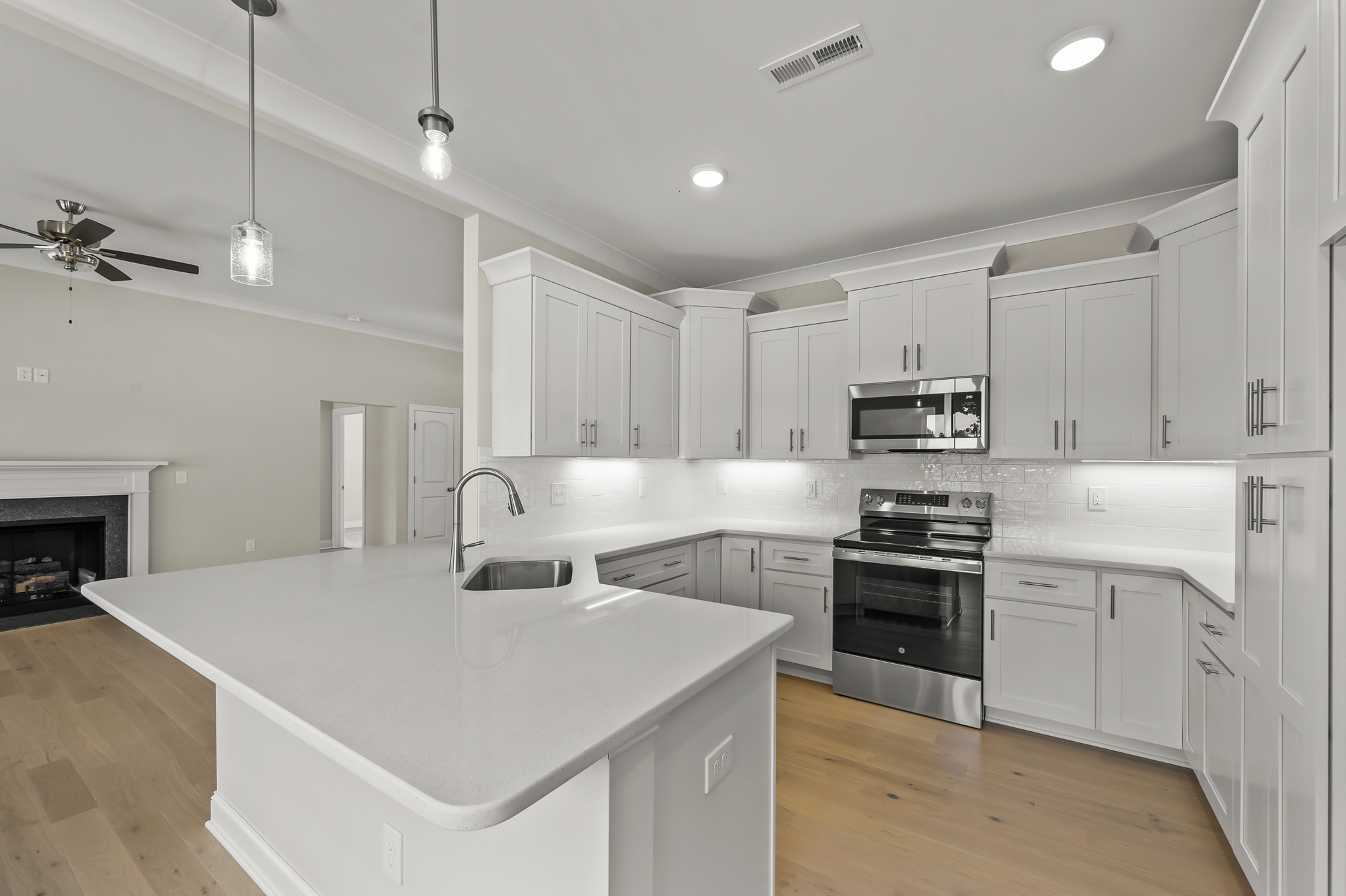 174 Cool Run - Kitchen with Island & White Cabinetry