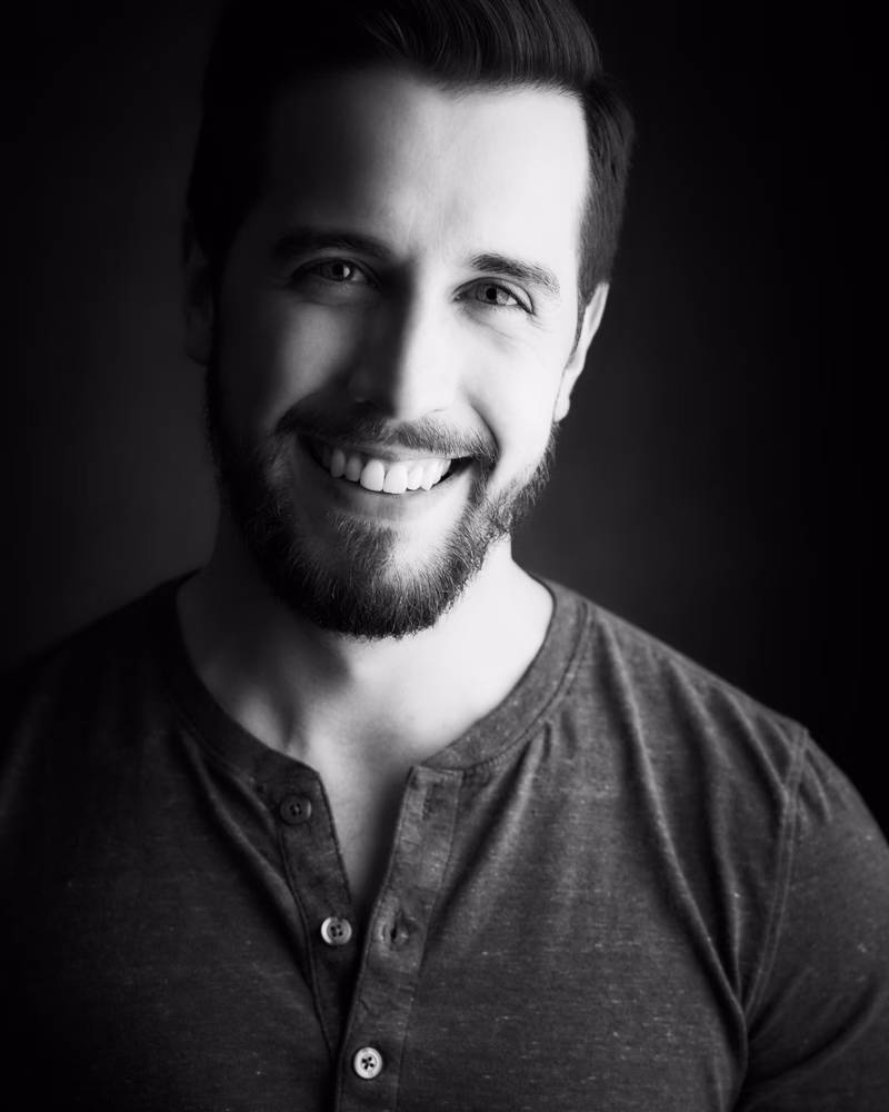 Black and white portrait of Mark Henick