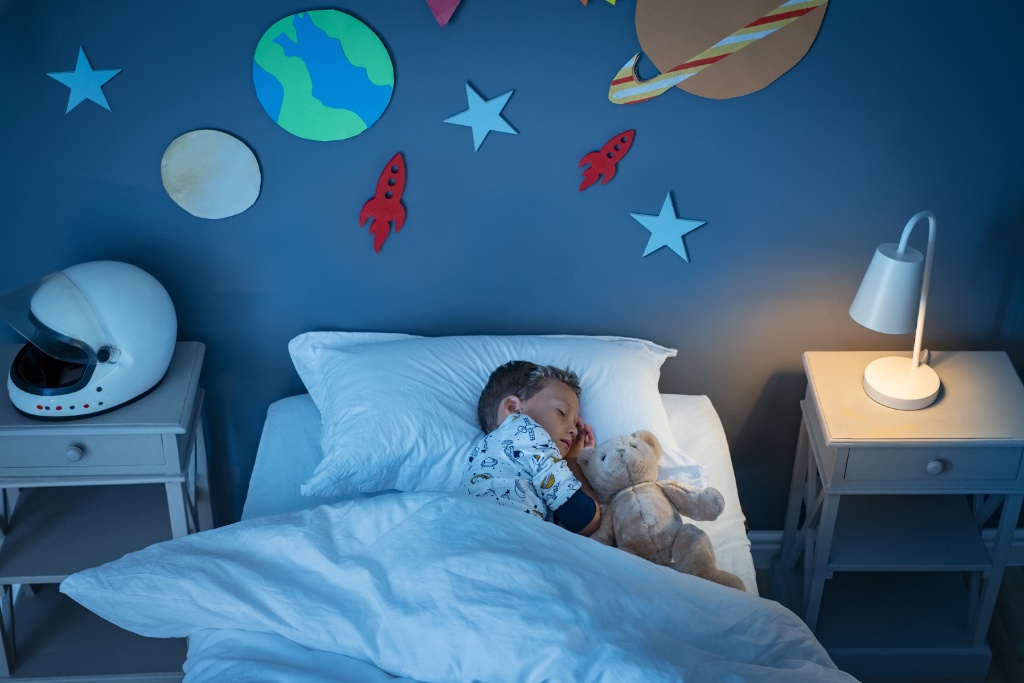 Child sleeping in bed