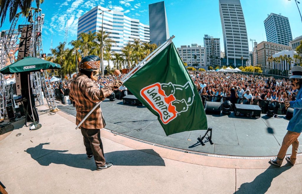 DiverCity crowd with Jarritos flag