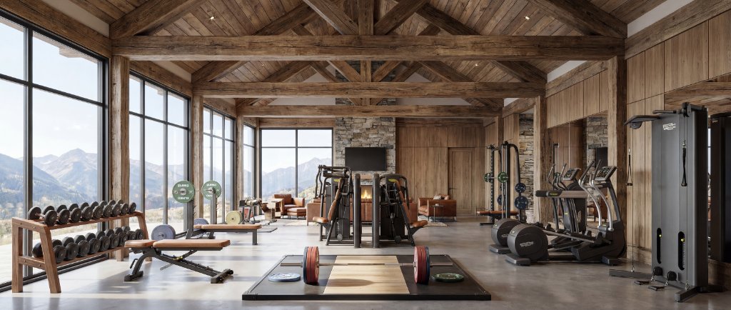 Luxury home gym interior with premium equipment and floor to ceiling mirrors showing modern gym design
