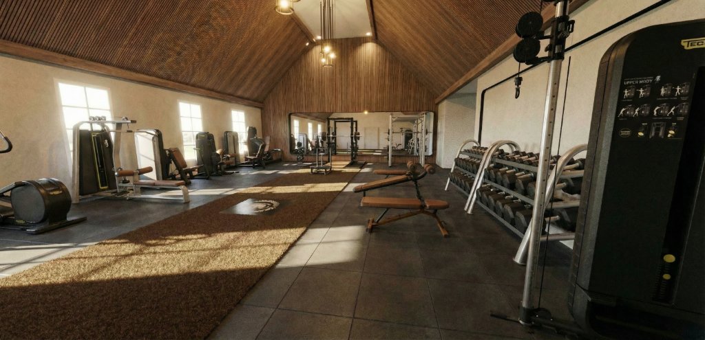 Selectorised machine line and Technogym cardio equipment along window wall in Highland Park luxury gym