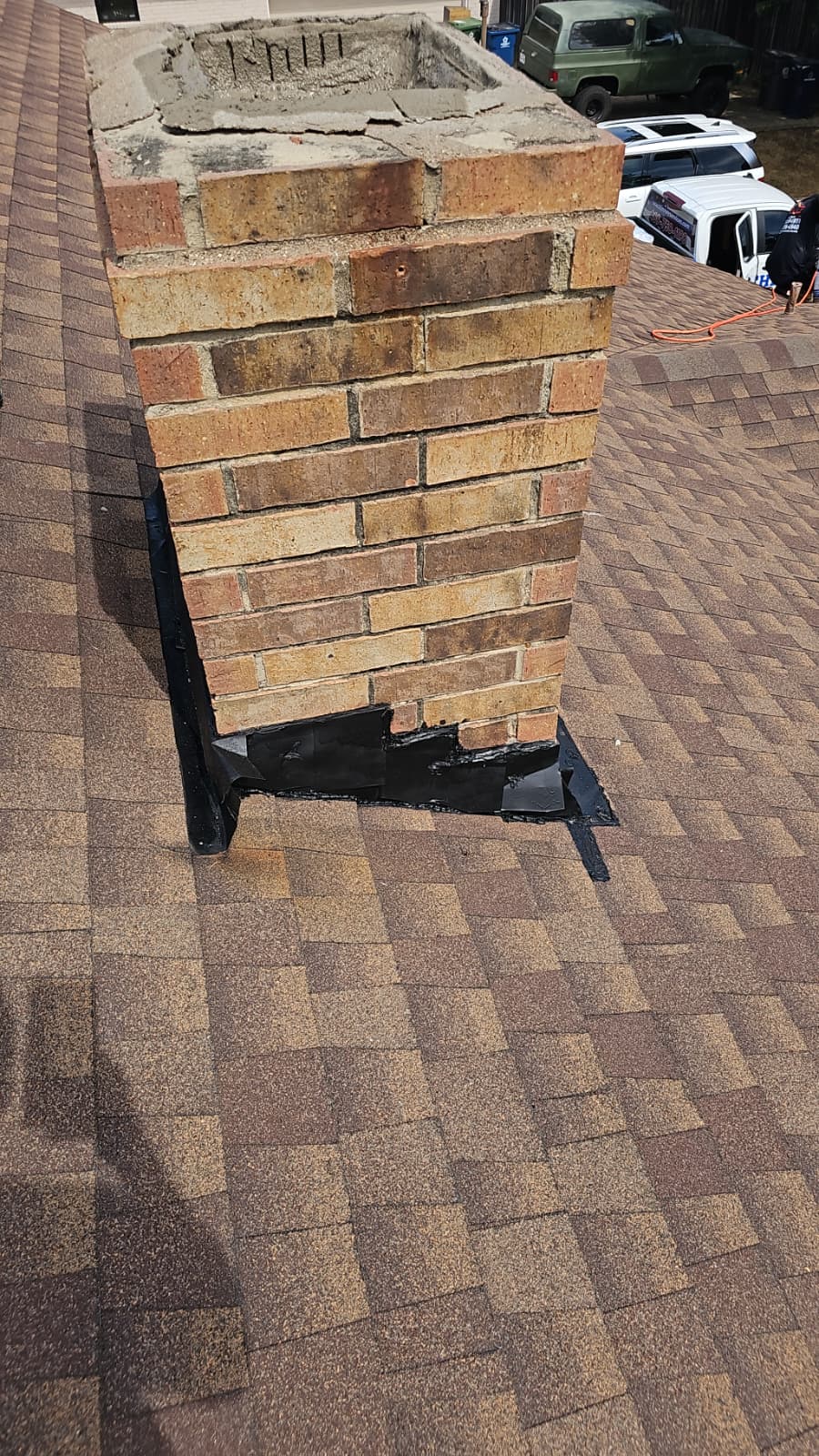 Chimney flashing repair on DFW roof