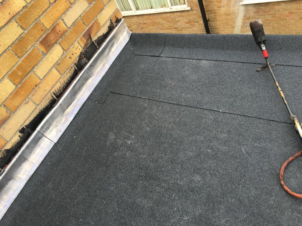 Flat Roof — Insulated Base Board Installed