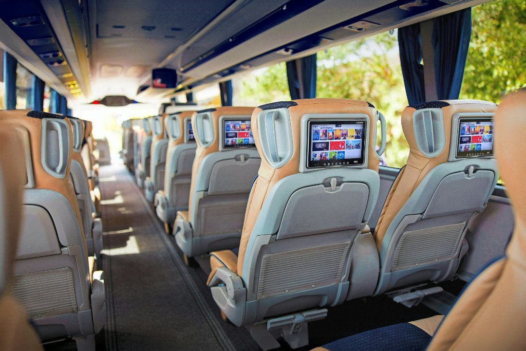Premium Luxuria coach interior with individual entertainment screens