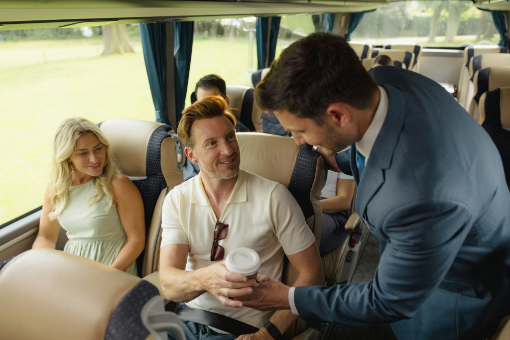 Attentive onboard service on a Leger Holidays Luxuria coach