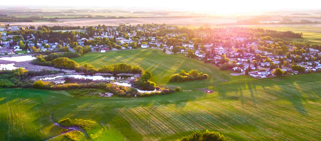 Aerial view of Bon Accord Alberta community and farmland