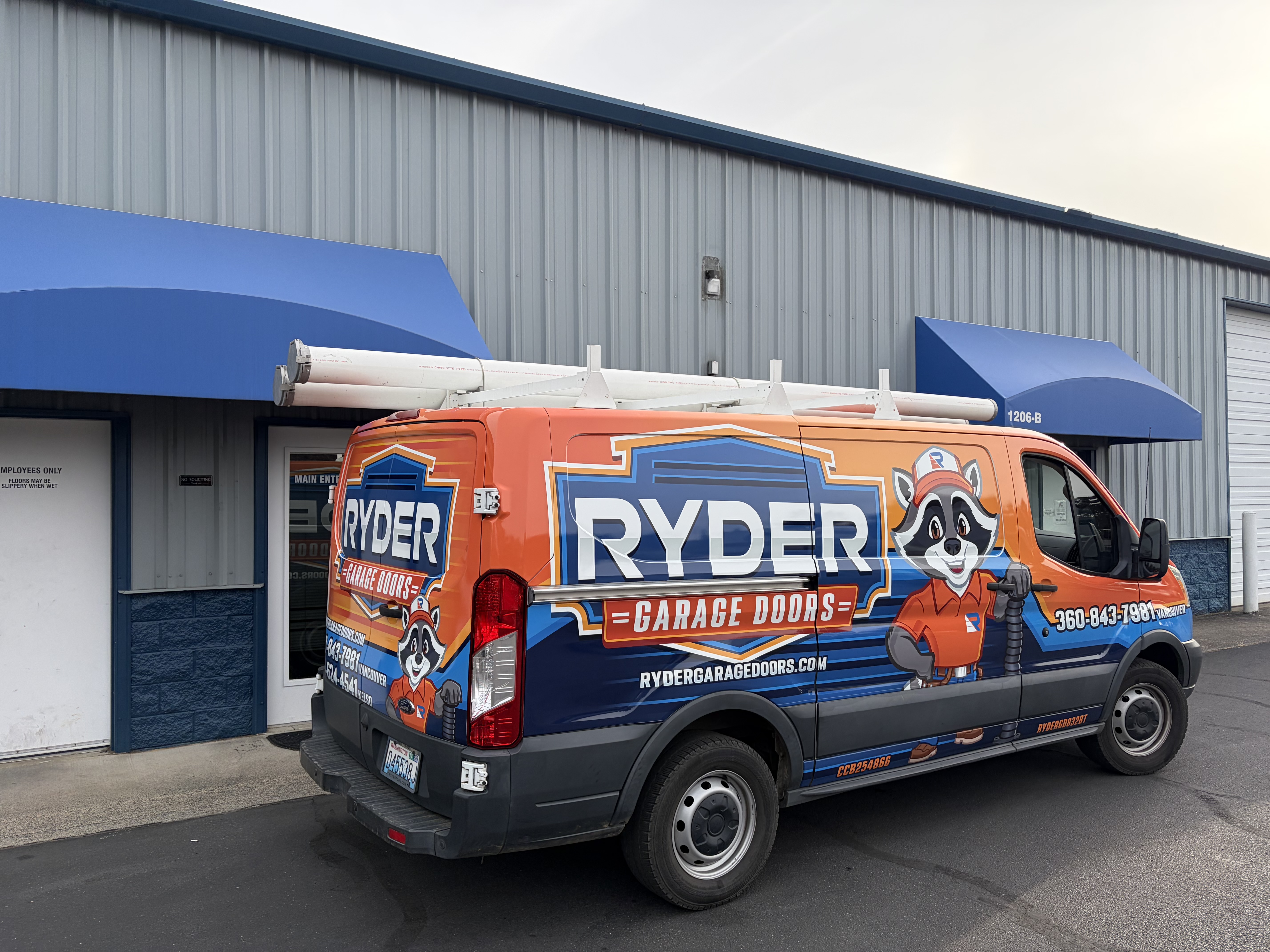 Ryder Garage Doors — Service Van — commercial vehicle wrap by Auto Studio in Vancouver, WA