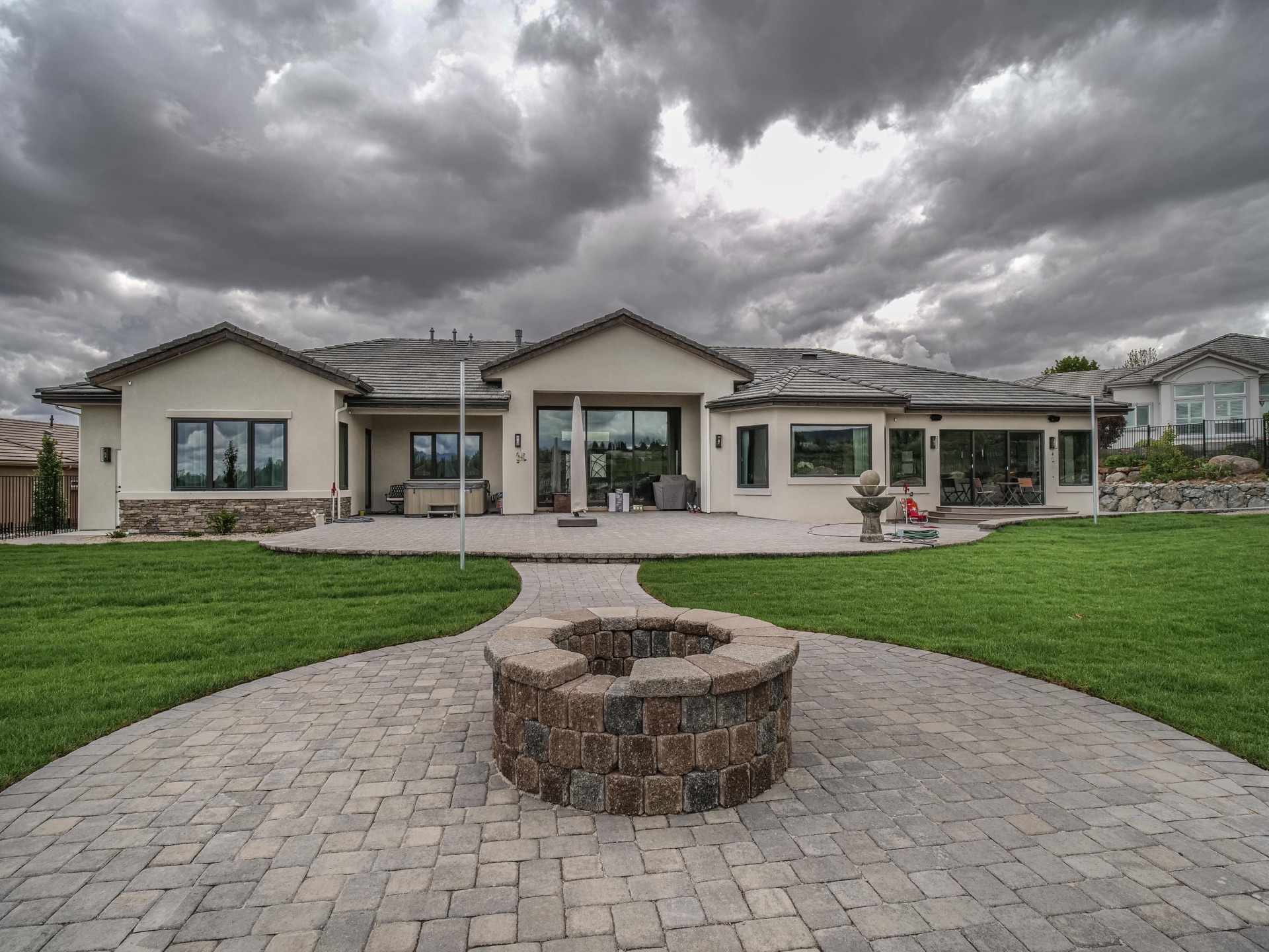 Iconic Landscape & Development — custom fire pit and paver patio in Northern Nevada