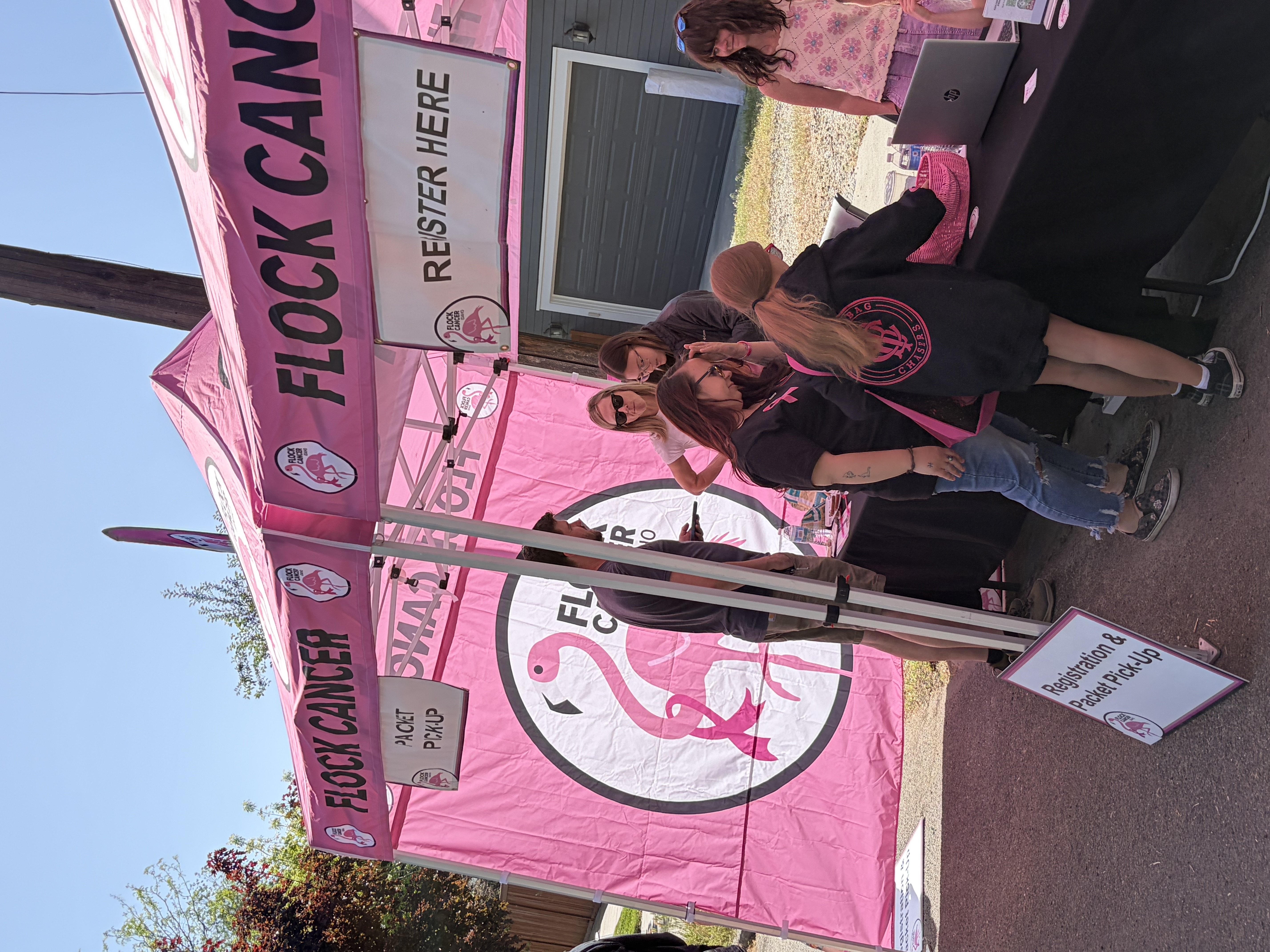 Flock Cancer registration and packet pickup