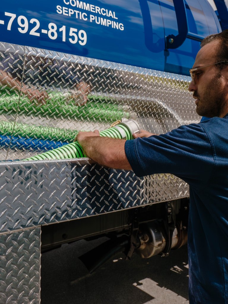 Clear Line Environmental Solutions technician working on equipment