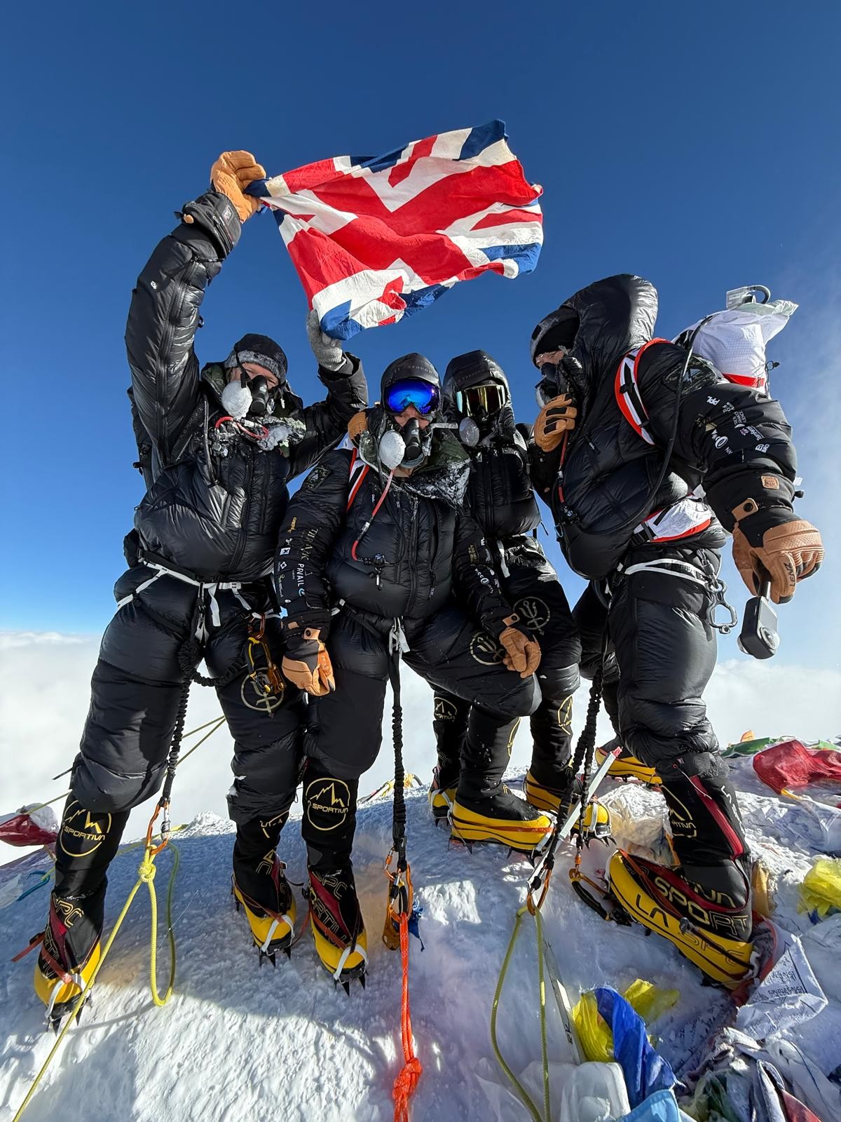 Summit of Everest with the UK flag
