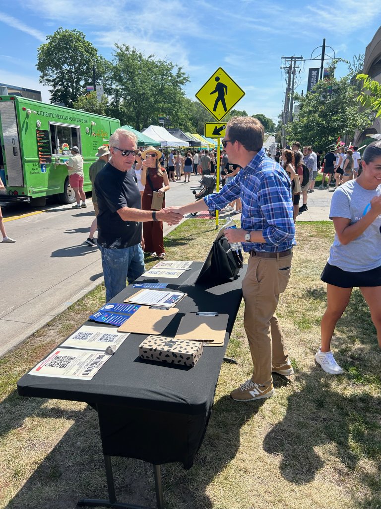 Michael Bridgford meeting supporters at a street festival
