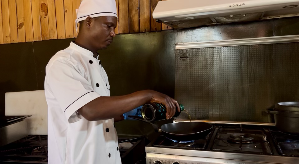 Chef preparing ingredients at Perk & Plate