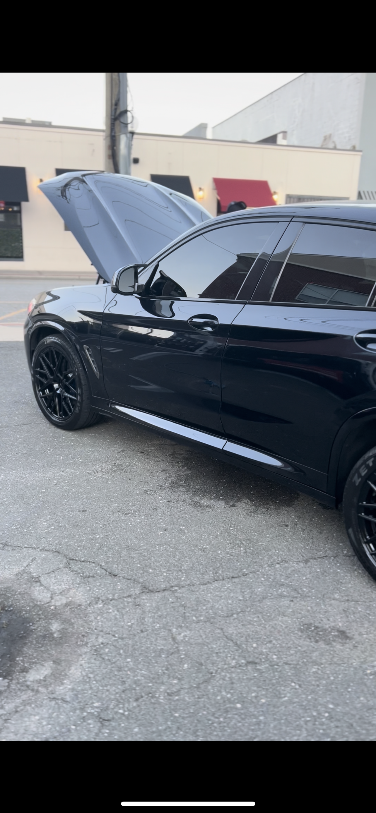 Black SUV detailed by JM Supreme Shine