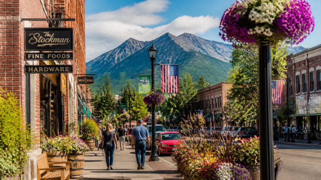 Montana downtown street with mountains and historic storefronts