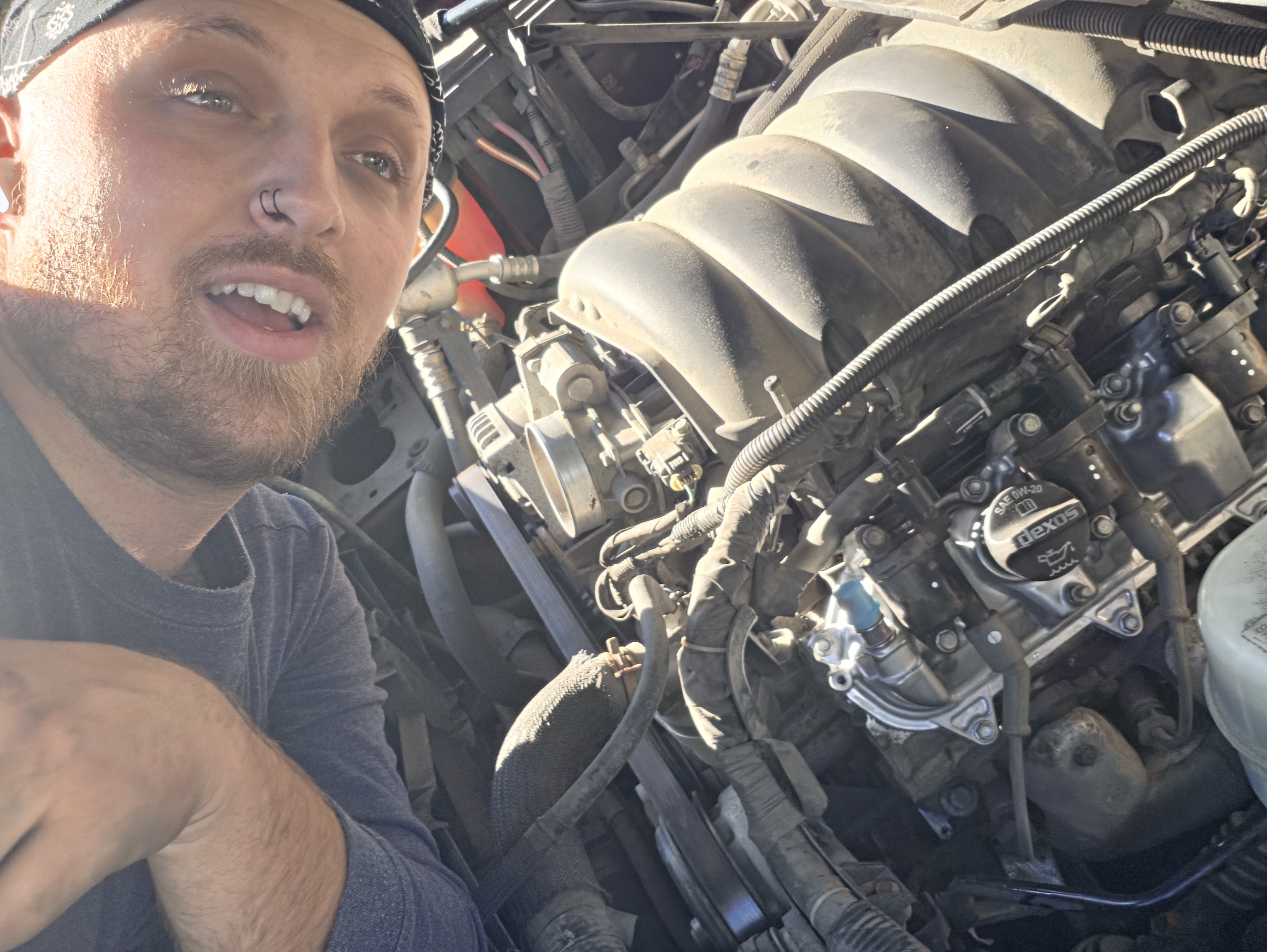 Your Vermont mobile technician working under the hood