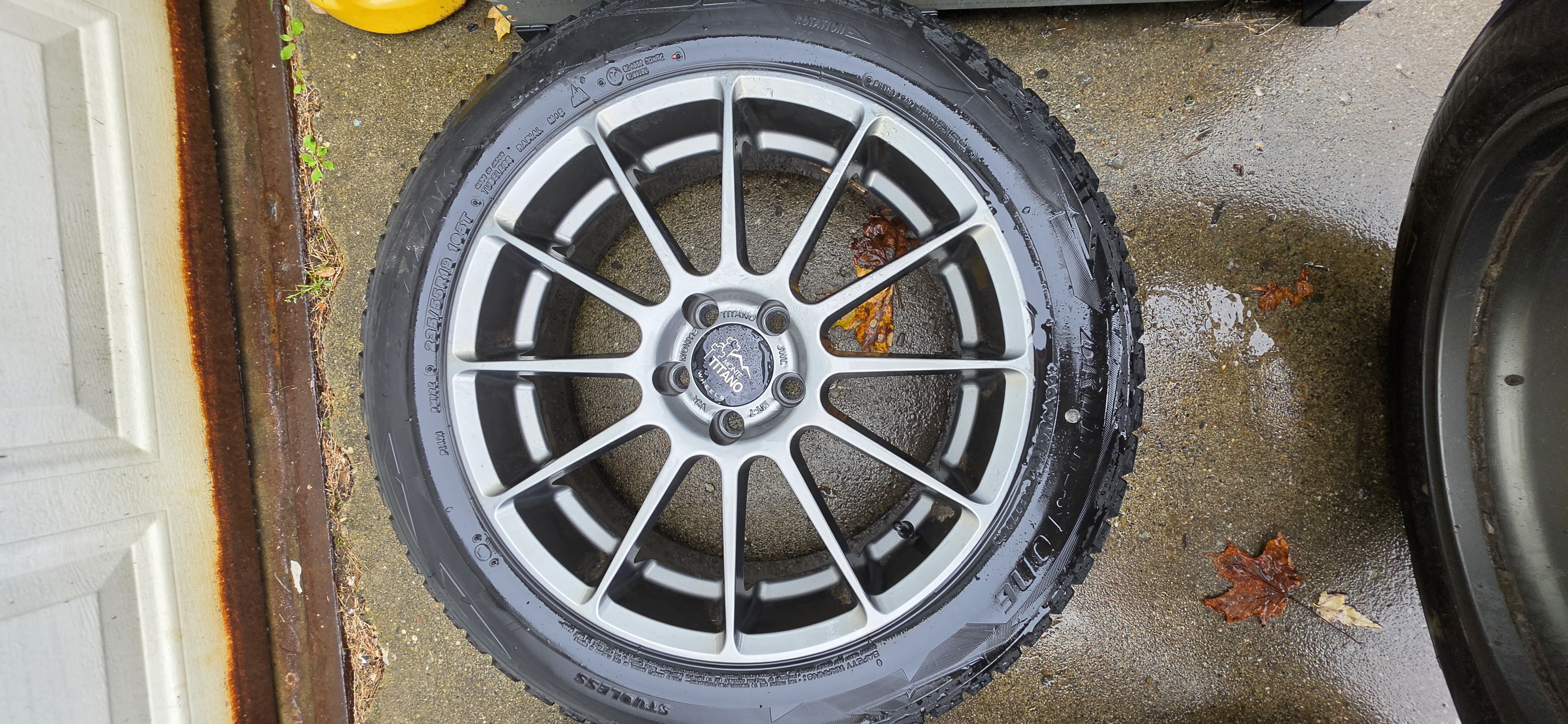 Fresh winter tire mounted and balanced on an alloy wheel
