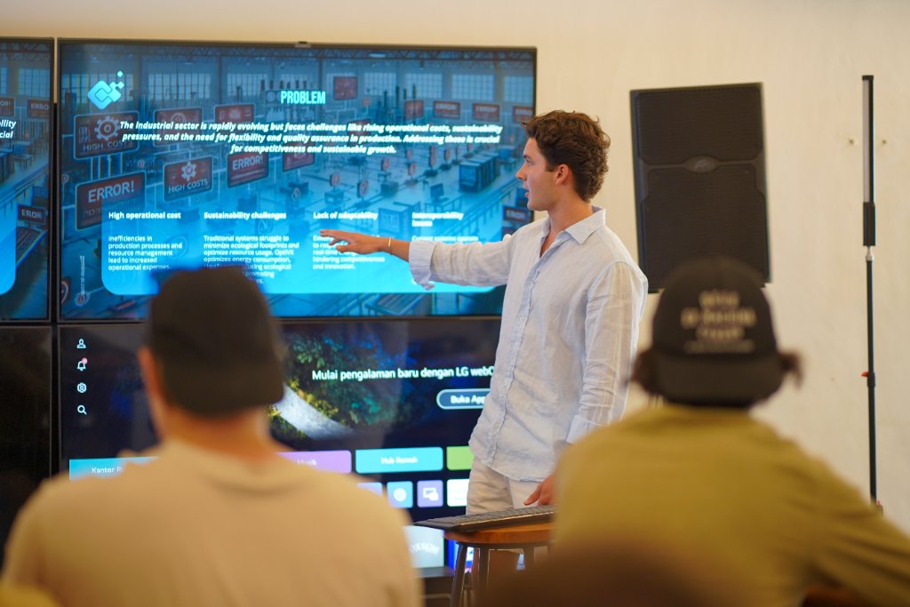 An EX EPIC Academy participant presenting a live venture project to the team