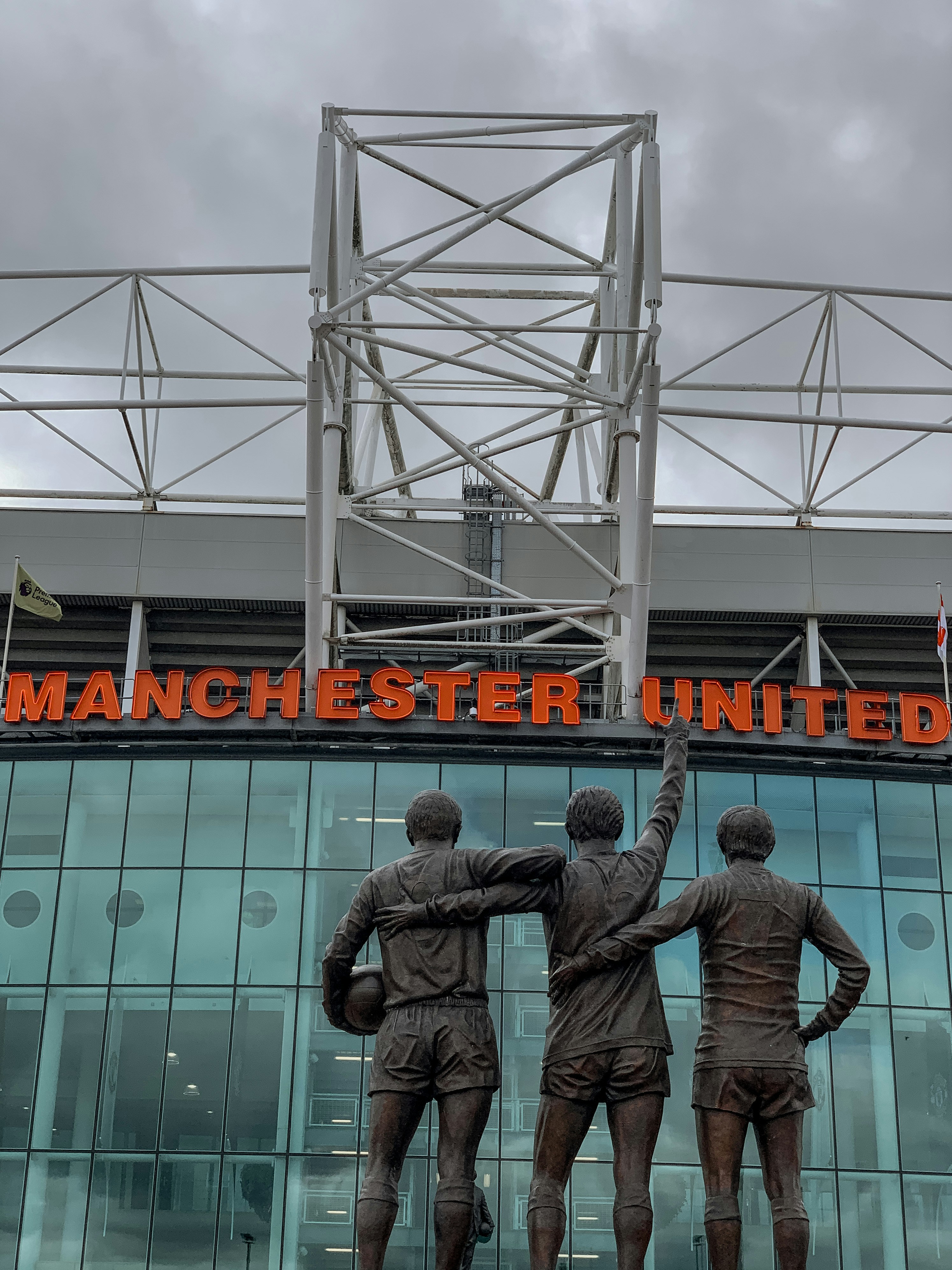 The United Trinity statue of George Best, Denis Law and Sir Bobby Charlton outside the East Stand at Old Trafford