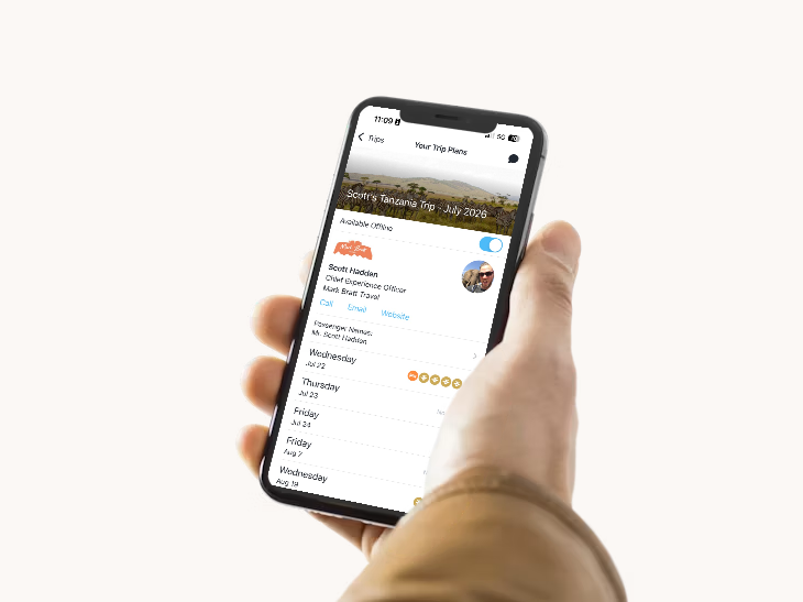 The Mark Bratt Travel app showing a trip itinerary on a phone