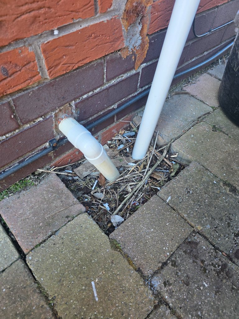 Flooded garden — drain located and cleared