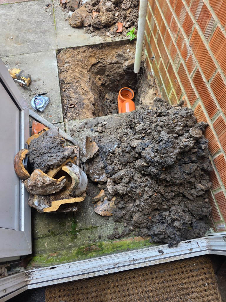Mining-era drain repair — subsidence damage