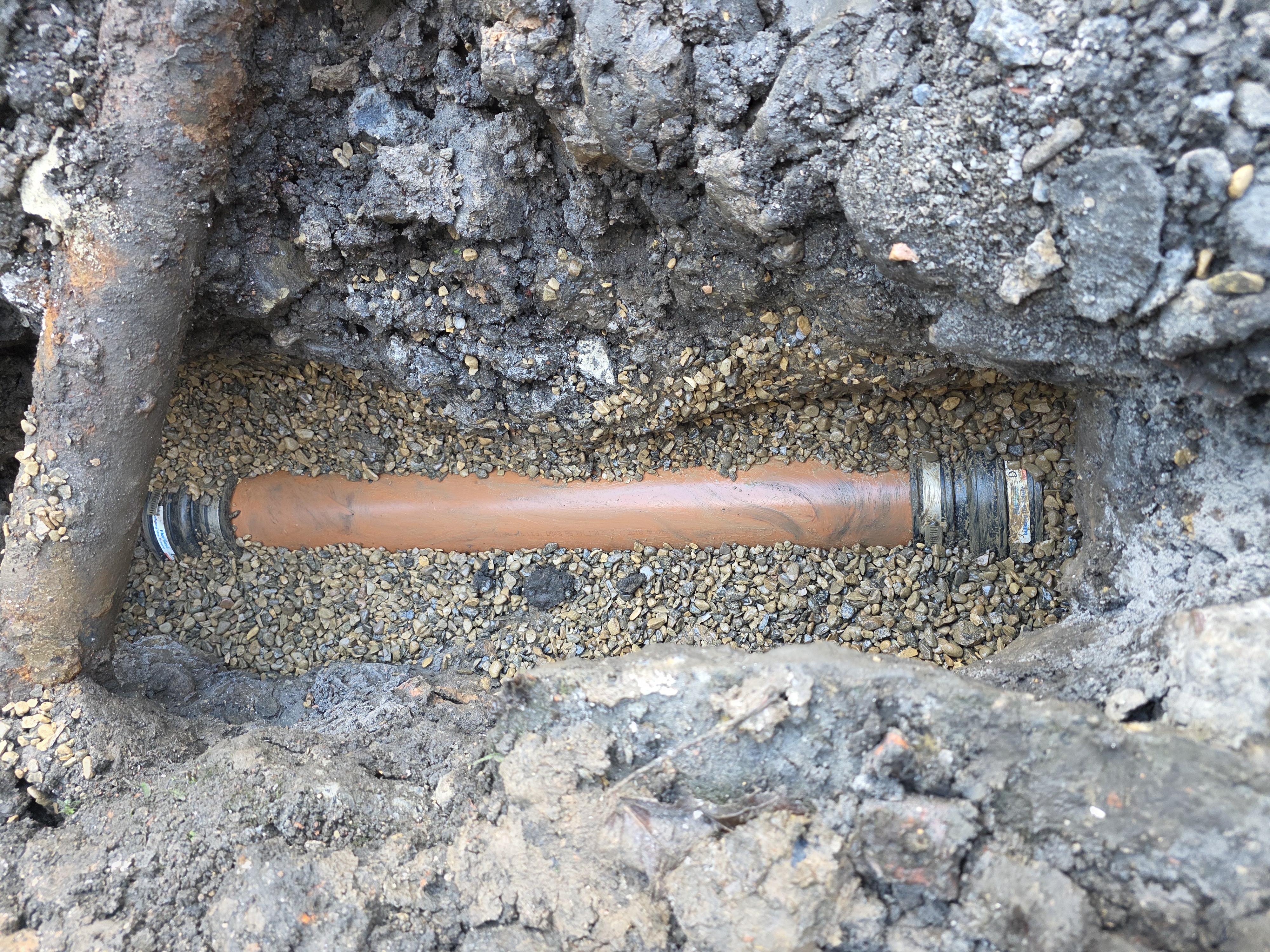 Pipe Repaired with New Section — After