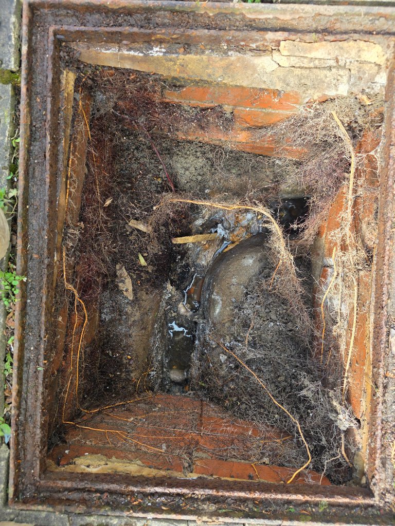 Blocked Drain with Debris — Before