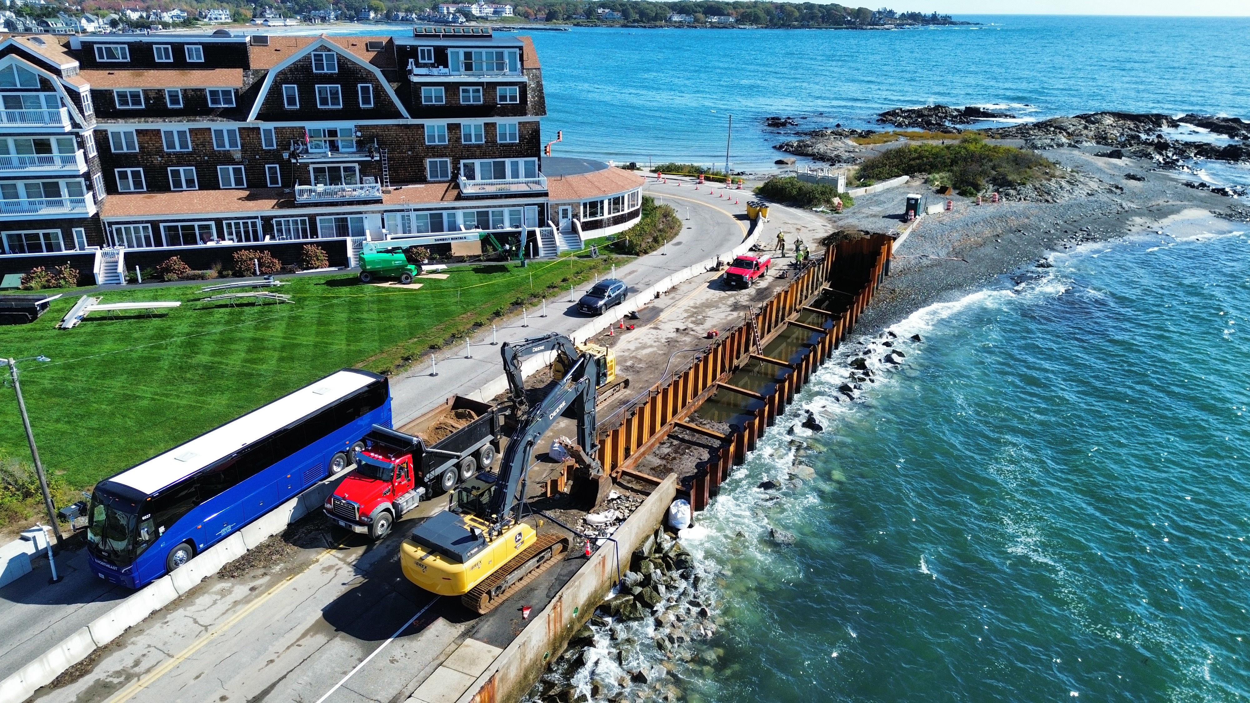 BREX Corp excavators and haul truck working on the Kennebunk Seawall project