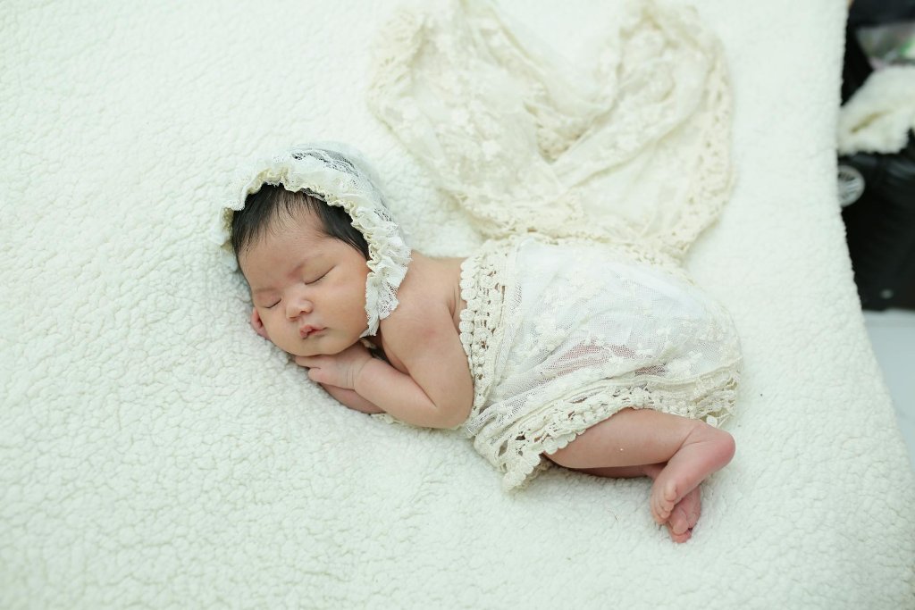 Newborn Baby Poses with Parents
