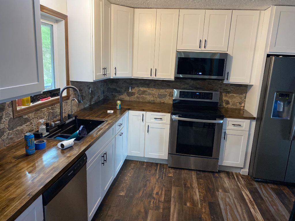 White shaker kitchen with butcher block in Longview, WA