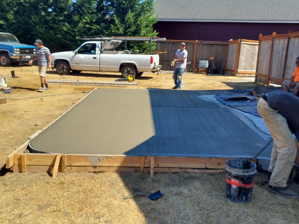 Concrete pad pour in progress in Woodland, WA
