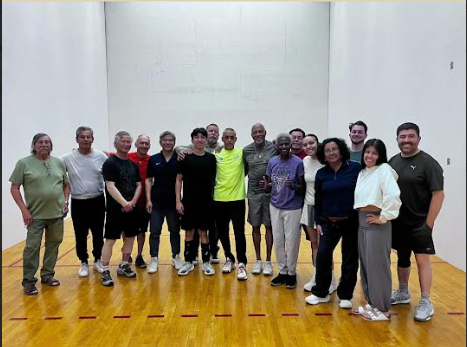 Racquetball community members on the court at the October 18 fundraiser