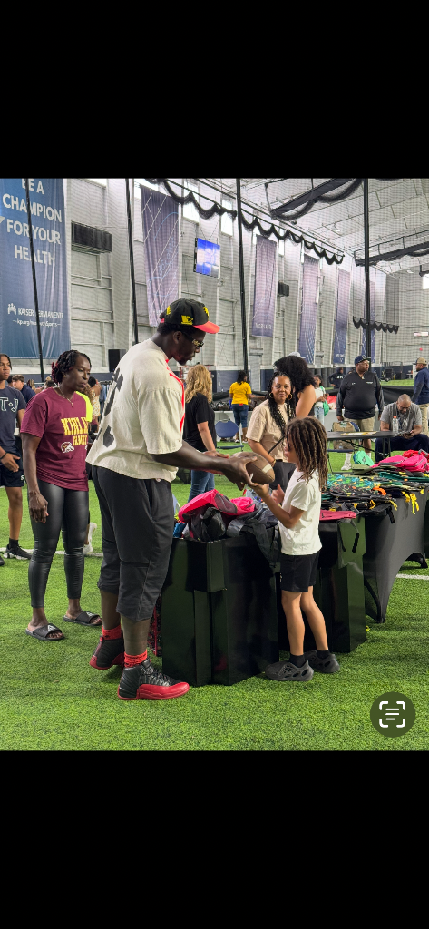 Pro athlete connecting with students during our back to school