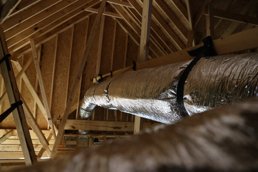 Duct Run Attached to Support Beam — New Construction