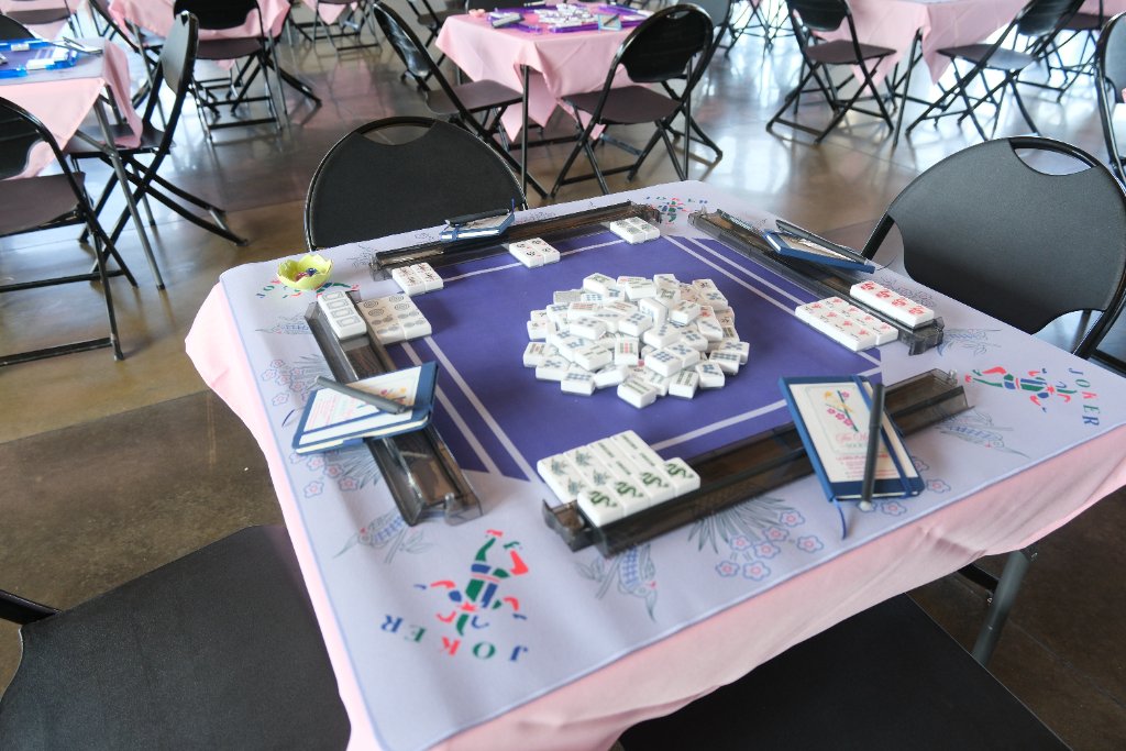 Close-up of mahjong tiles in play
