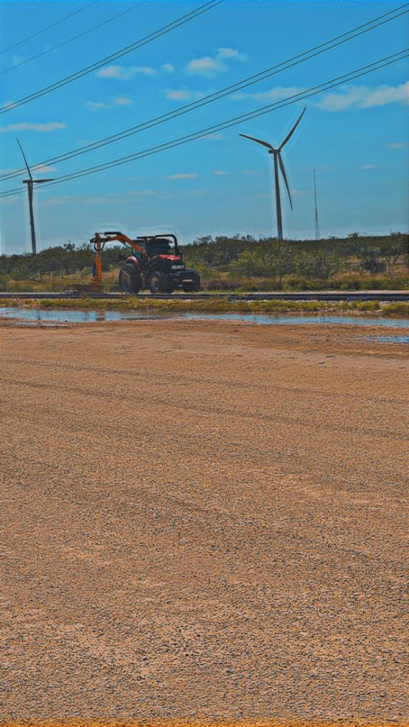 Boom Mower with Wind Turbines