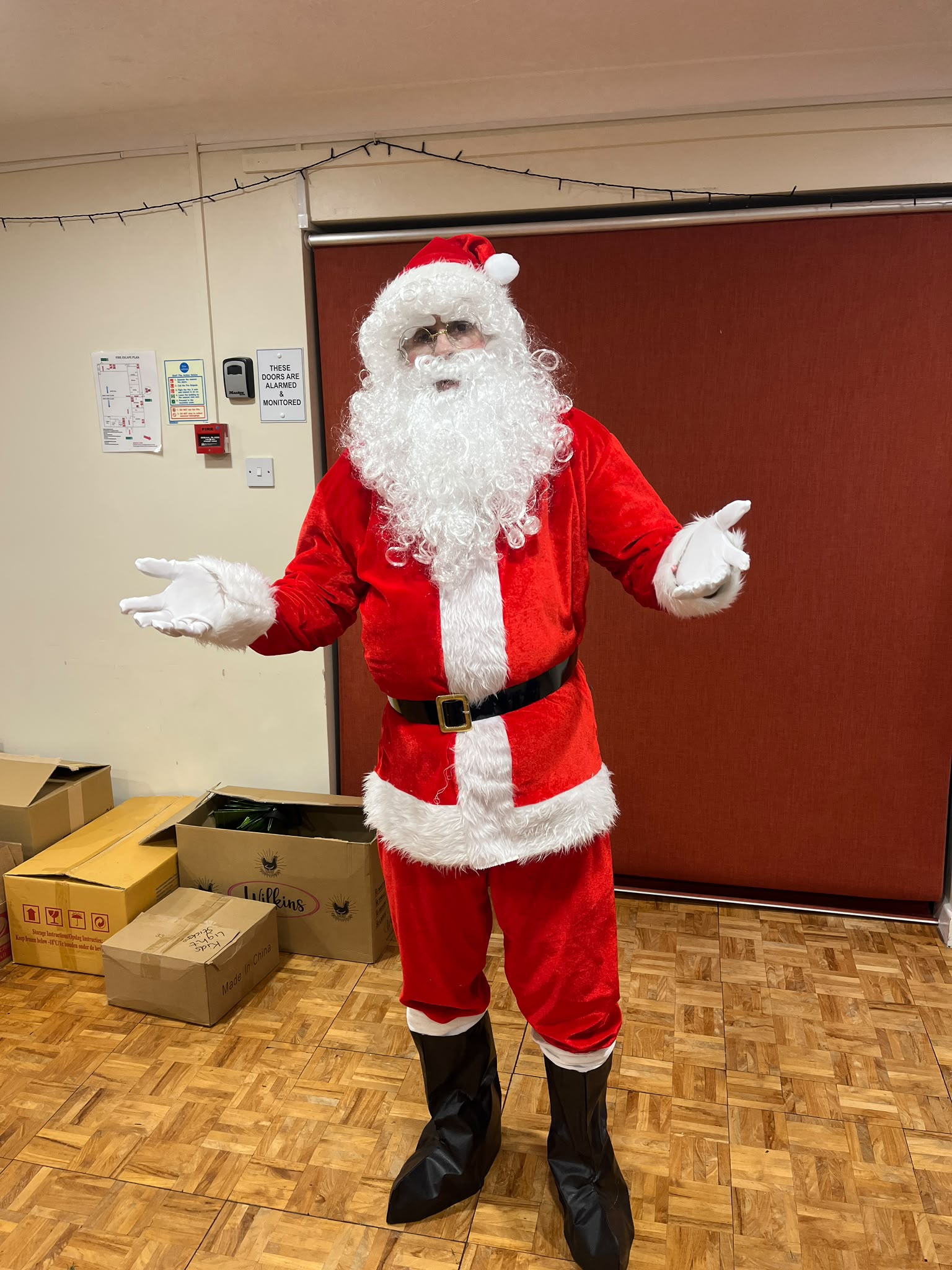 Our professional Santa Claus performer at a Caped Crusaders Christmas event