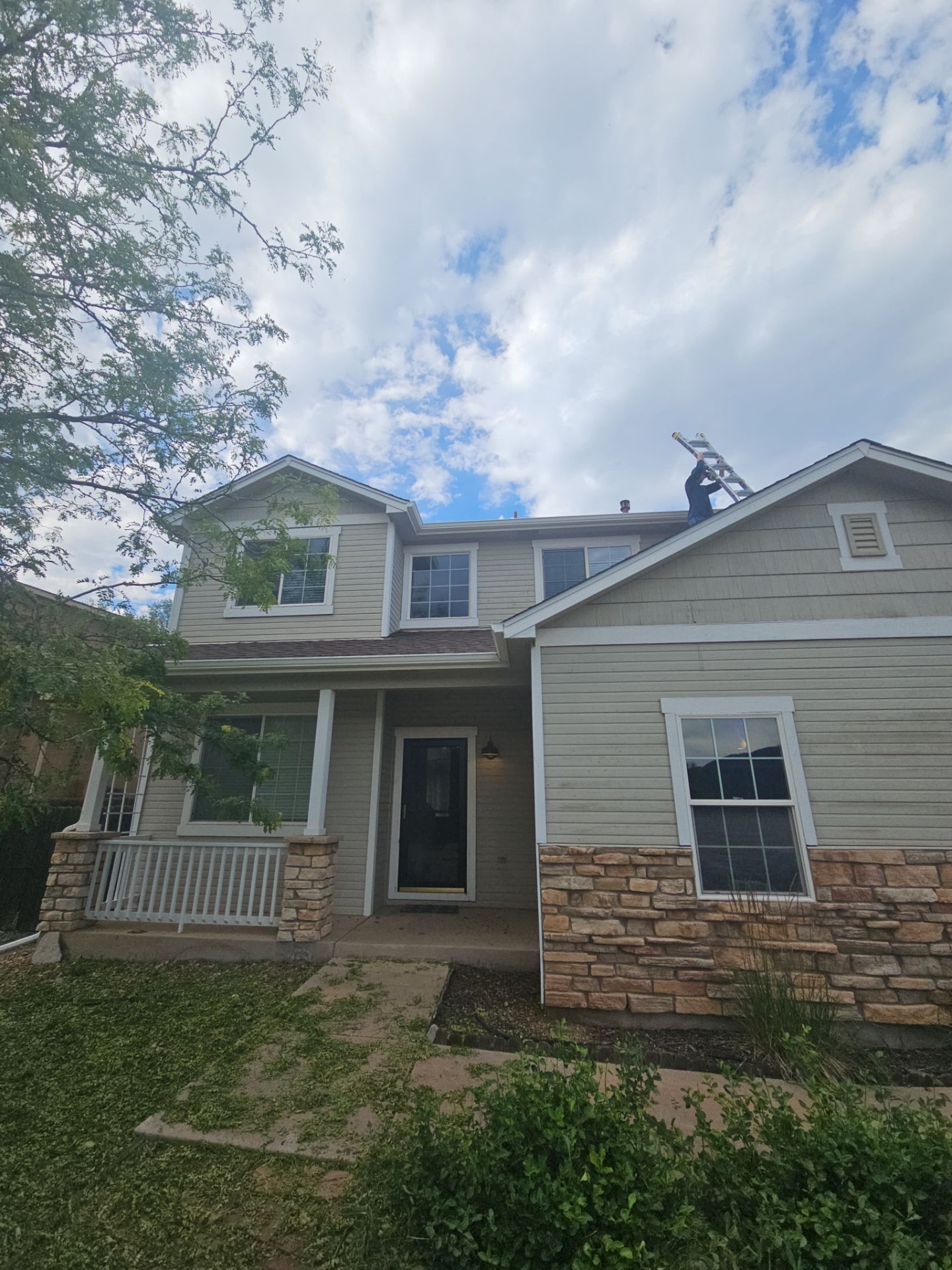 Front elevation of the Colorado Springs home during exterior hail restoration