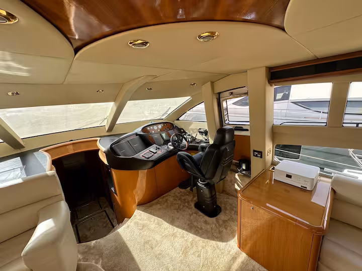 Helm station — walnut dash and captain's chair