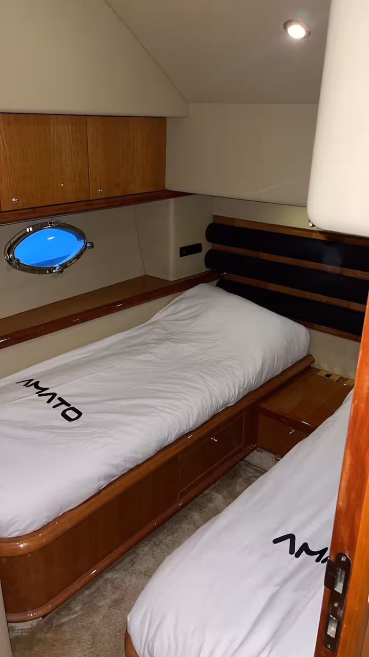 Guest twin cabin — AMATO branded beds