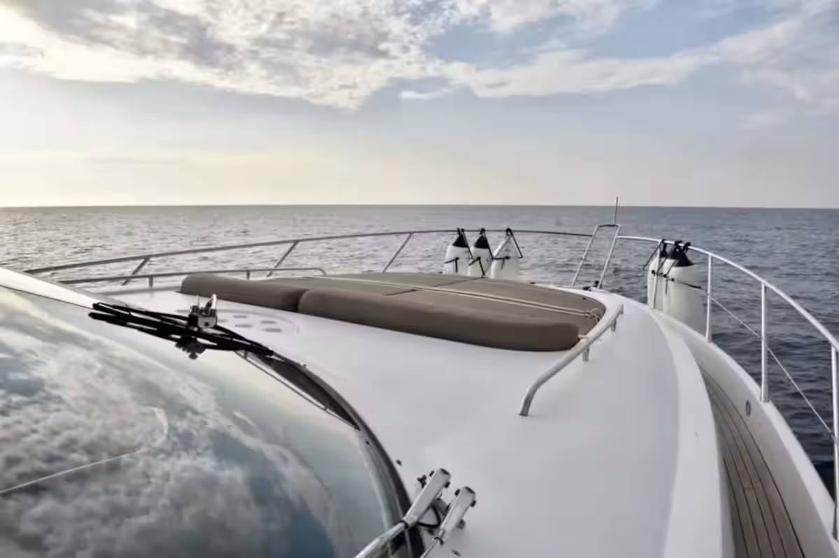 Foredeck sun loungers — open sea horizon