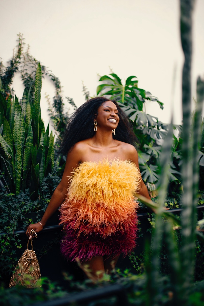 Kofi Duah — woman in feather dress
