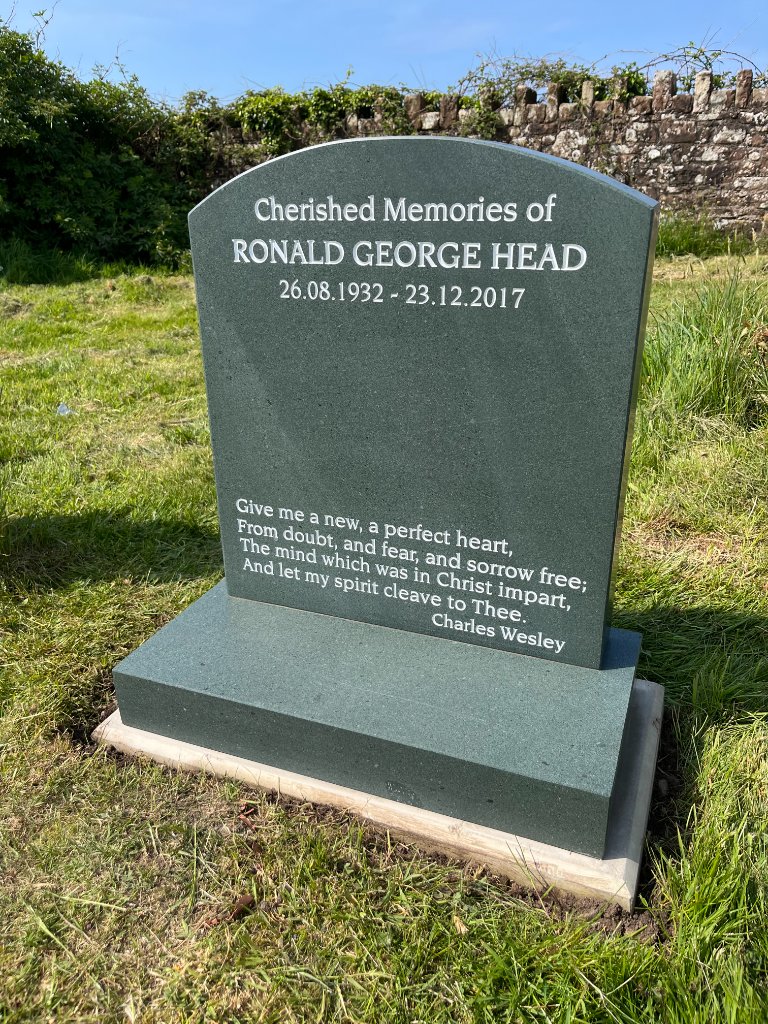 Green granite memorial headstone