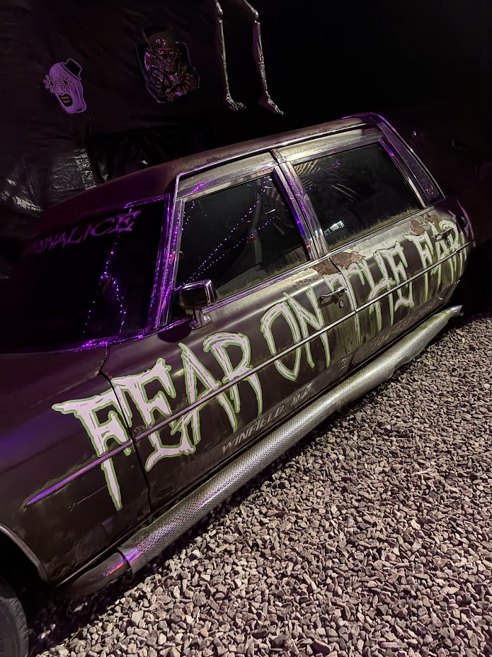 Fear on the Farm hearse vehicle with slime-green graffiti lettering reading FEAR ON THE FARM, Winfield WV