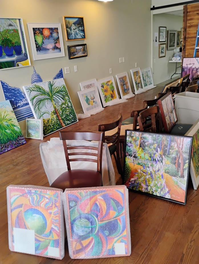 Art filling the gallery — the collection begins to take shape